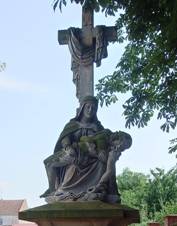 https://upload.wikimedia.org/wikipedia/commons/thumb/9/9b/Kn%C4%9B%C5%BEdub%2C_pieta.jpg/800px-Kn%C4%9B%C5%BEdub%2C_pieta.jpg