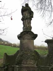 Podhrad, torzo souso svatho Jana Nepomuckho se svatm Vavincem a svatm Dontem.jpg