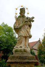 https://upload.wikimedia.org/wikipedia/commons/thumb/f/ff/Socha_sv._Jana_Nepomuck%C3%A9ho%2C_Uhy%2C_okres_Kladno_03.JPG/800px-Socha_sv._Jana_Nepomuck%C3%A9ho%2C_Uhy%2C_okres_Kladno_03.JPG