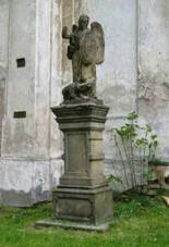 https://upload.wikimedia.org/wikipedia/commons/5/5d/Socha_and%C4%9Bla_ve_Skuhrov%C4%9B_u_kostela_%28Q94444966%29_01.jpg
