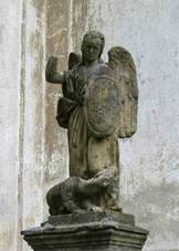 https://upload.wikimedia.org/wikipedia/commons/5/5d/Socha_and%C4%9Bla_ve_Skuhrov%C4%9B_u_kostela_%28Q94444966%29_01.jpg