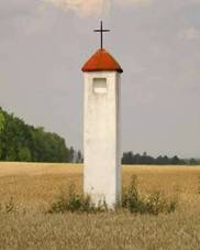 https://upload.wikimedia.org/wikipedia/commons/thumb/3/36/Bo%C5%BE%C3%AD_muka_na_okraji_Un%C4%8Dovic_u_d%C3%A1lnice_%28Q72740723%29_01.jpg/1024px-Bo%C5%BE%C3%AD_muka_na_okraji_Un%C4%8Dovic_u_d%C3%A1lnice_%28Q72740723%29_01.jpg