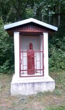 Socha sv. Ambroe na velask stezce u Malhostovic.jpg